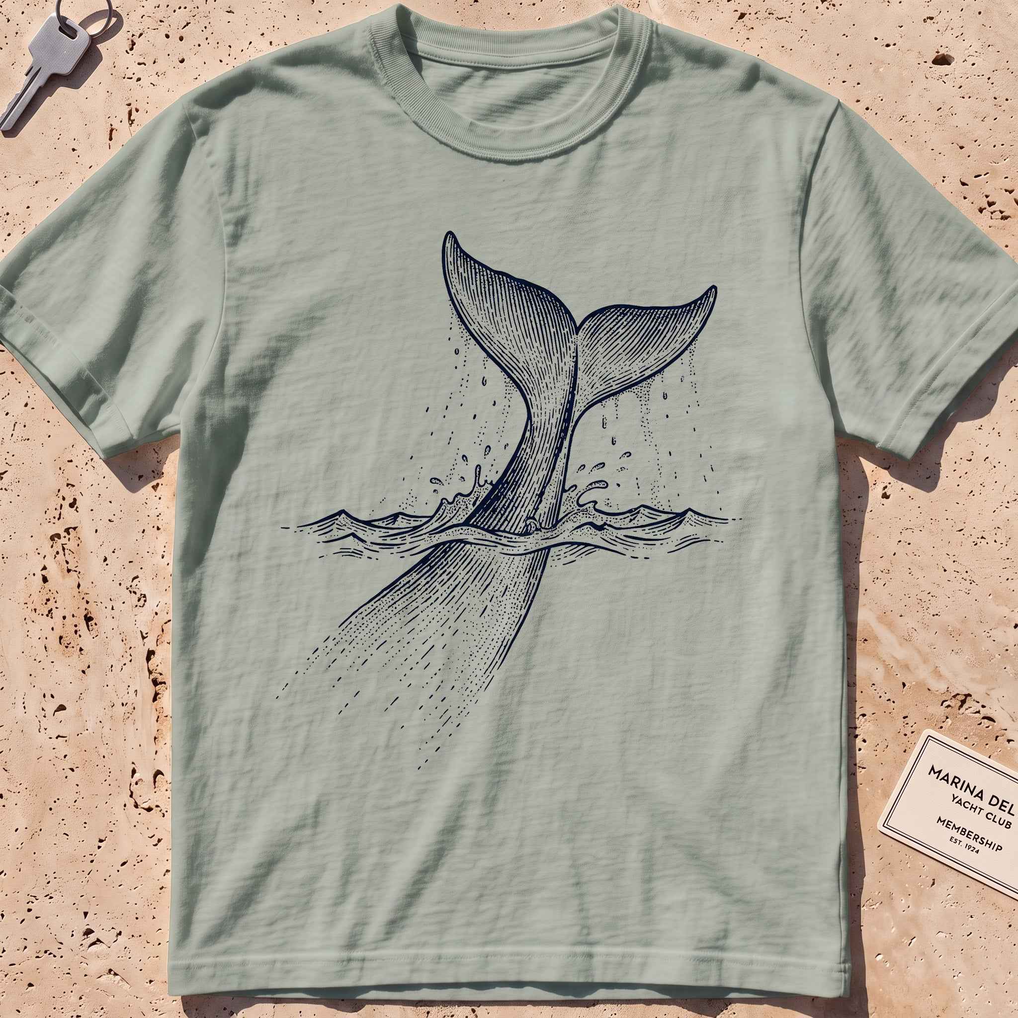 bay heavyweight tee with an etched sperm whale diving deep graphic.