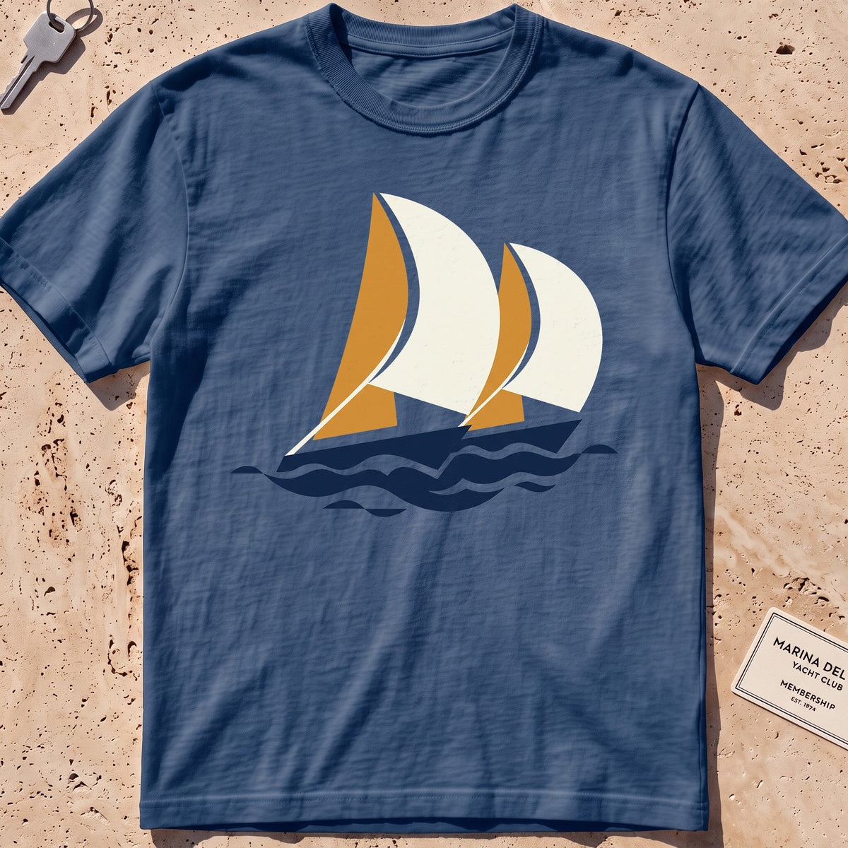 midnight heavyweight tee with flat-geometric racing spinnakers graphic.