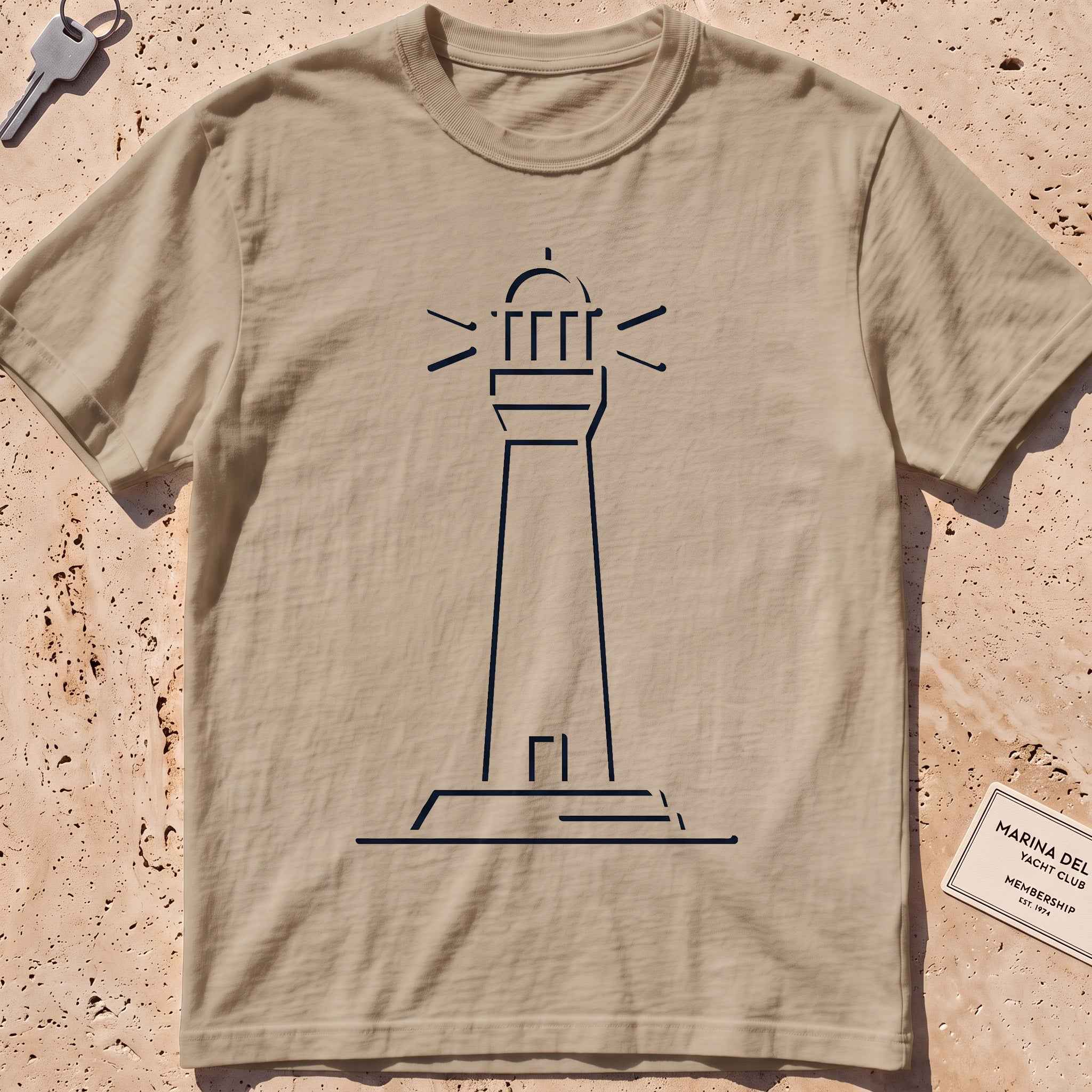 khaki heavyweight tee with a single-line lighthouse graphic.