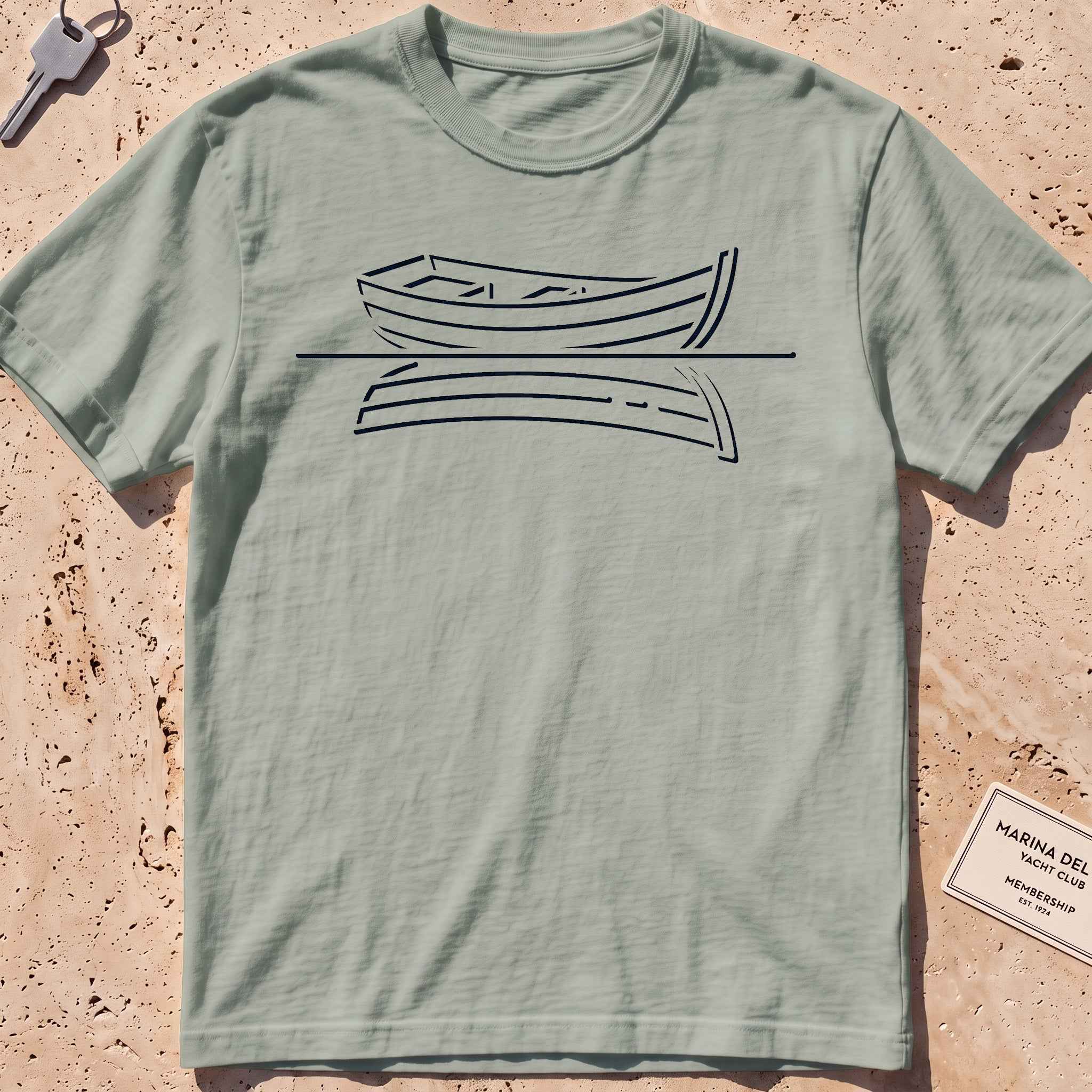 bay heavyweight tee with a single-line rowboat and still-water reflection.