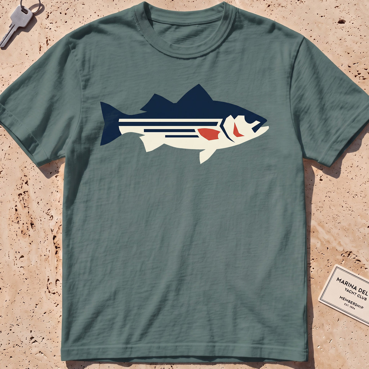 blue spruce heavyweight tee with a flat-geometric striped bass graphic.