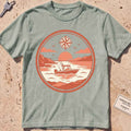 bay heavyweight tee with a circular sportfisher "Sunset Run" sunset badge.