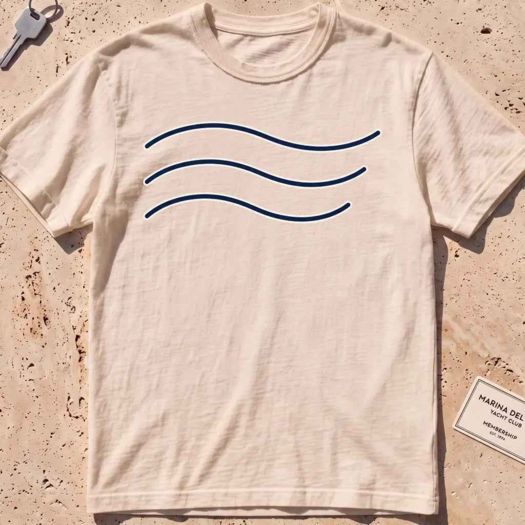 ivory heavyweight tee with three minimal-line swell curves graphic.