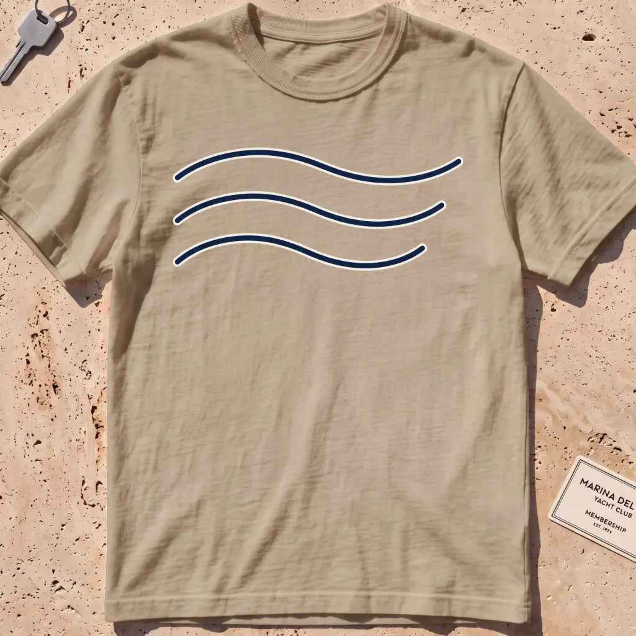 khaki heavyweight tee with three minimal-line swell curves graphic.