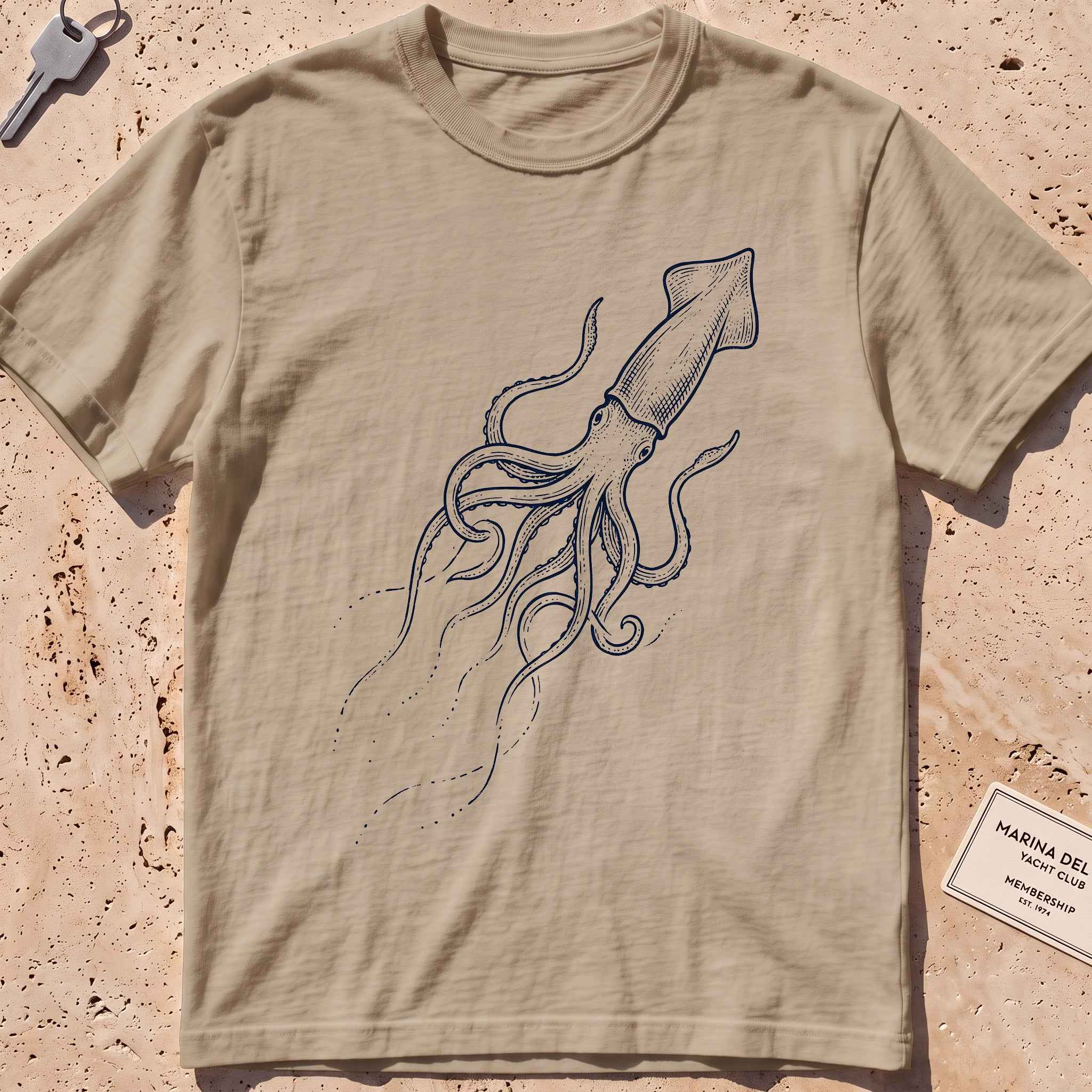 khaki heavyweight tee with an etched giant squid from the deep graphic.