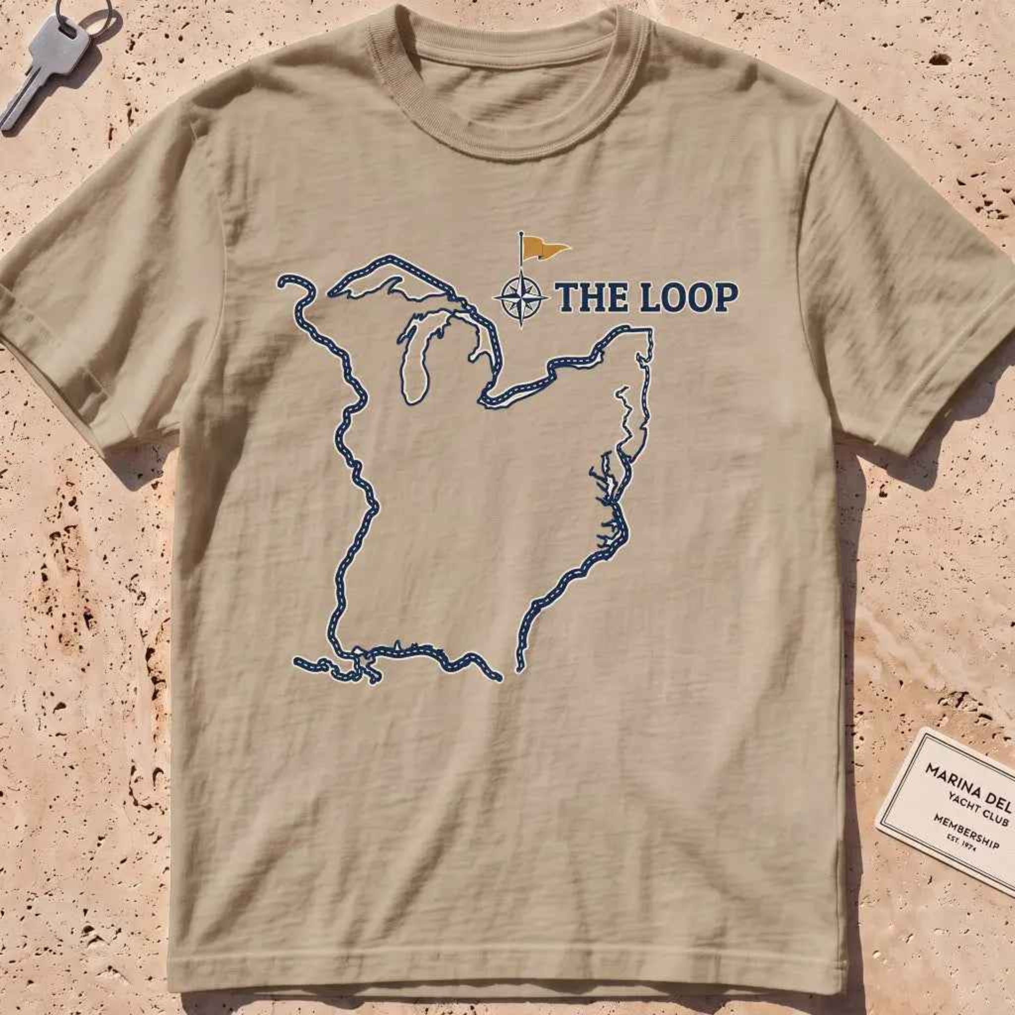 khaki heavyweight tee with a Great Loop route map and burgee graphic.