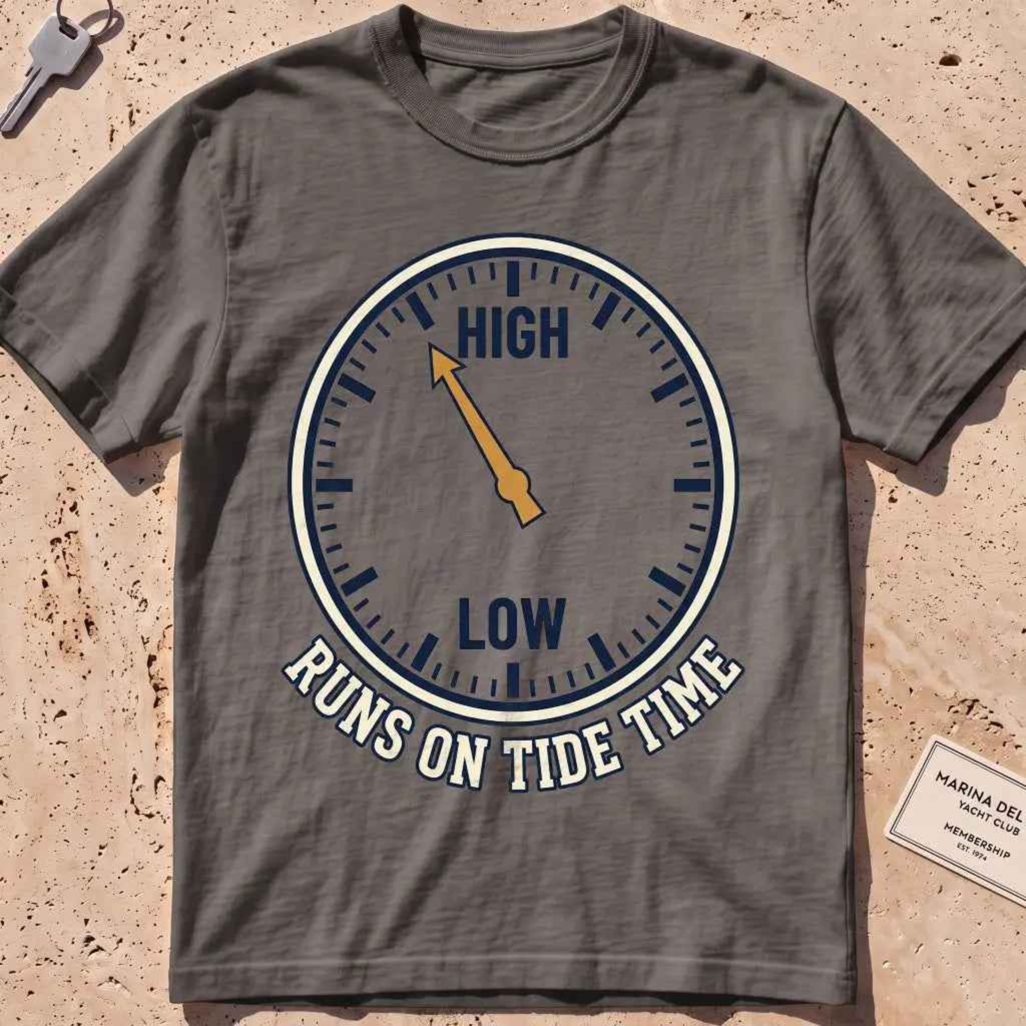pepper heavyweight tee with a tide-clock face and "Runs on Tide Time" text.