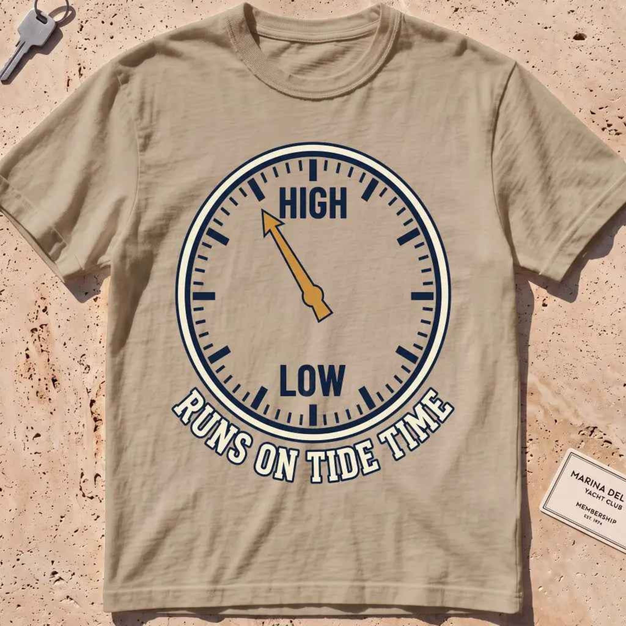 khaki heavyweight tee with a tide-clock face and "Runs on Tide Time" text.