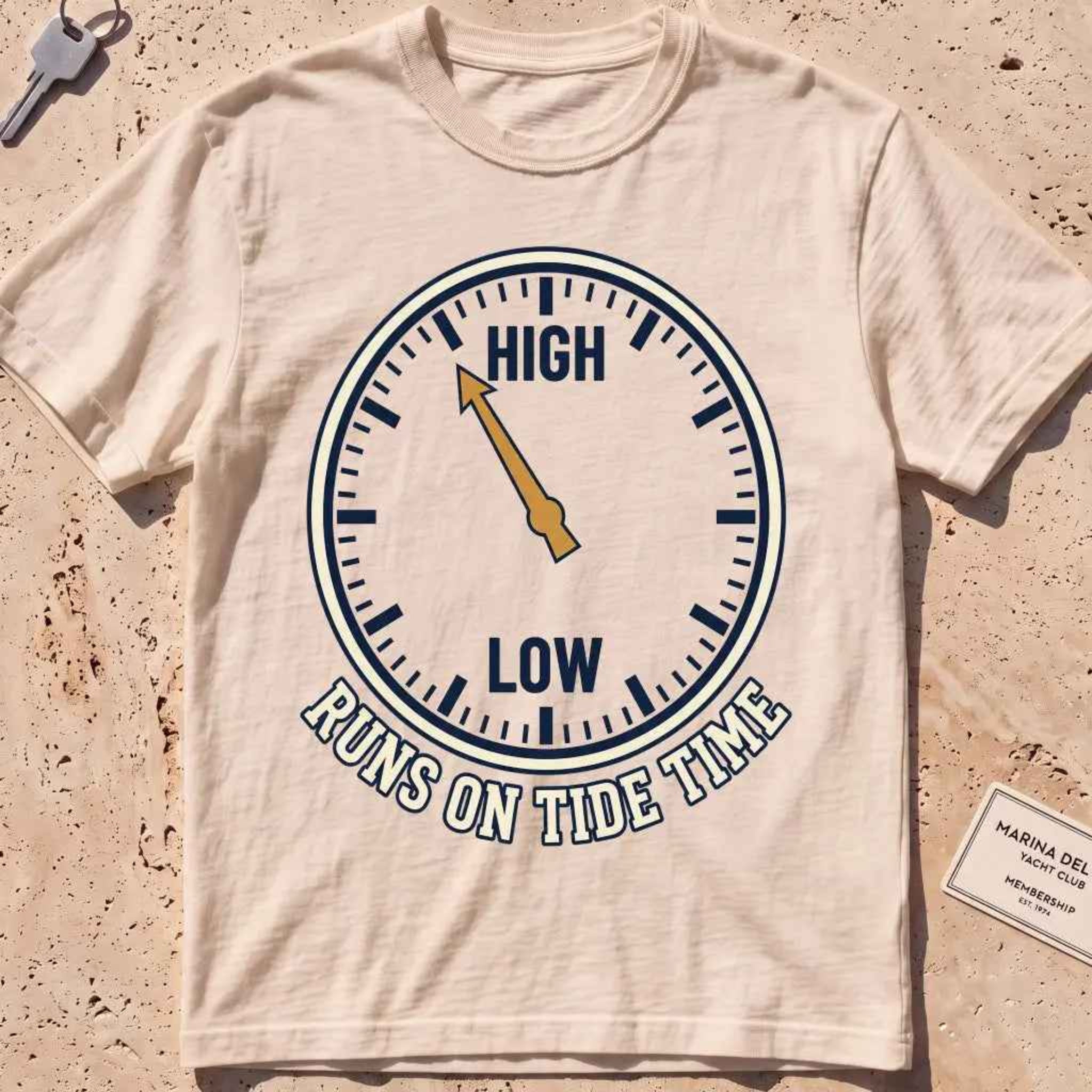 ivory heavyweight tee with a tide-clock face and "Runs on Tide Time" text.