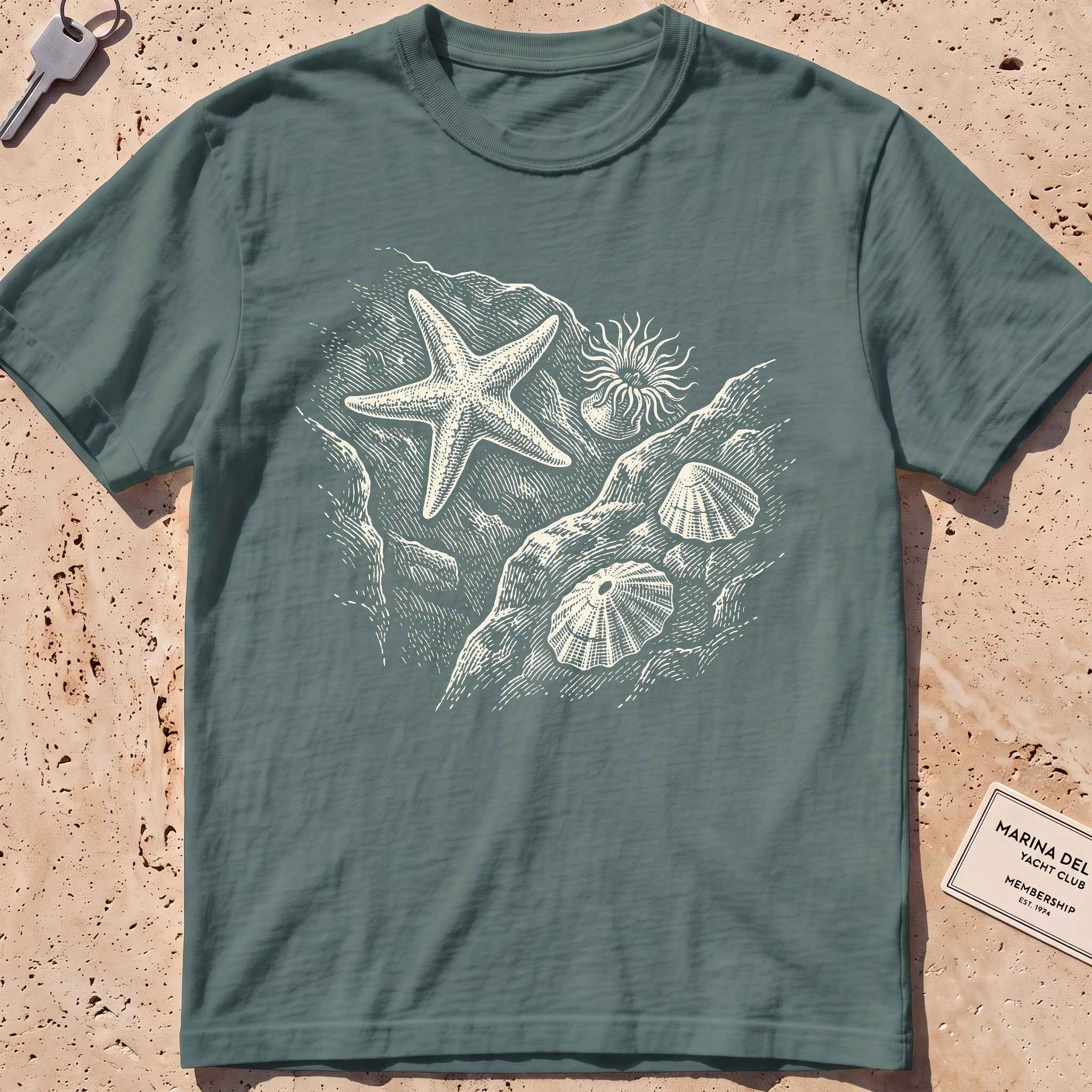 blue spruce heavyweight tee with an etched starfish and anemone tide pool graphic.