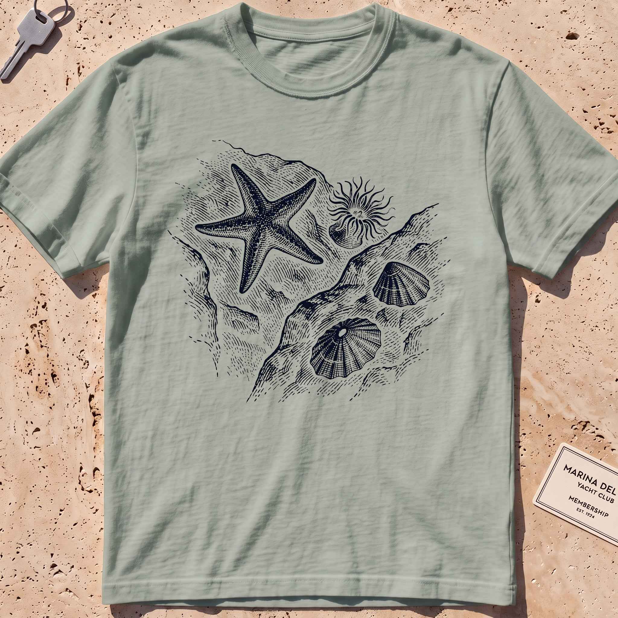 bay heavyweight tee with an etched starfish and anemone tide pool graphic.