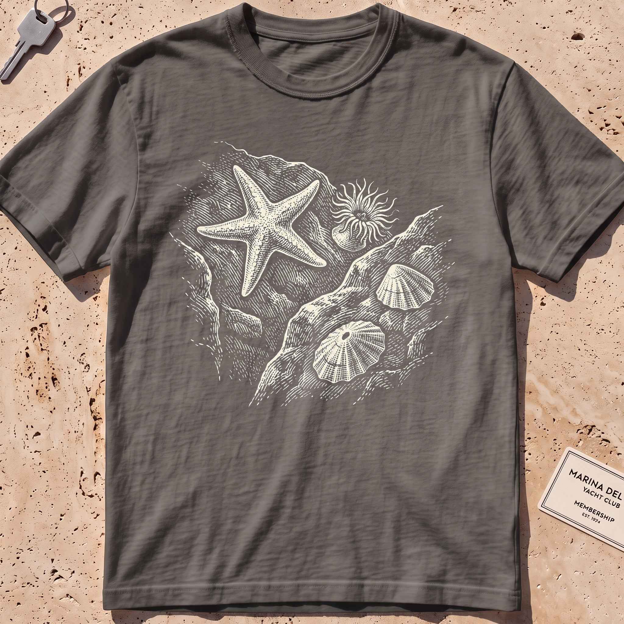 pepper heavyweight tee with an etched starfish and anemone tide pool graphic.