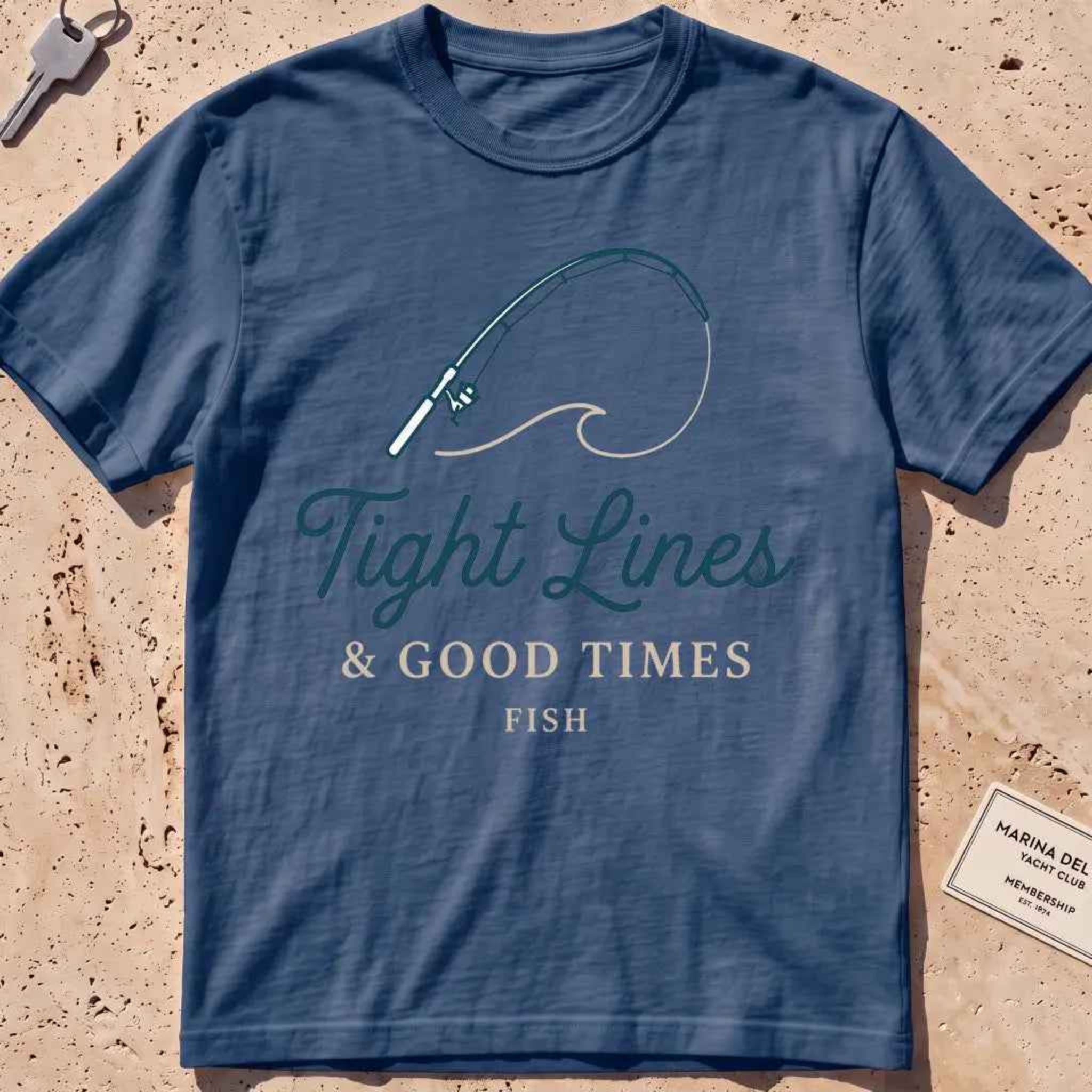 midnight heavyweight tee with a bent rod and "Tight Lines and Good Times" script.