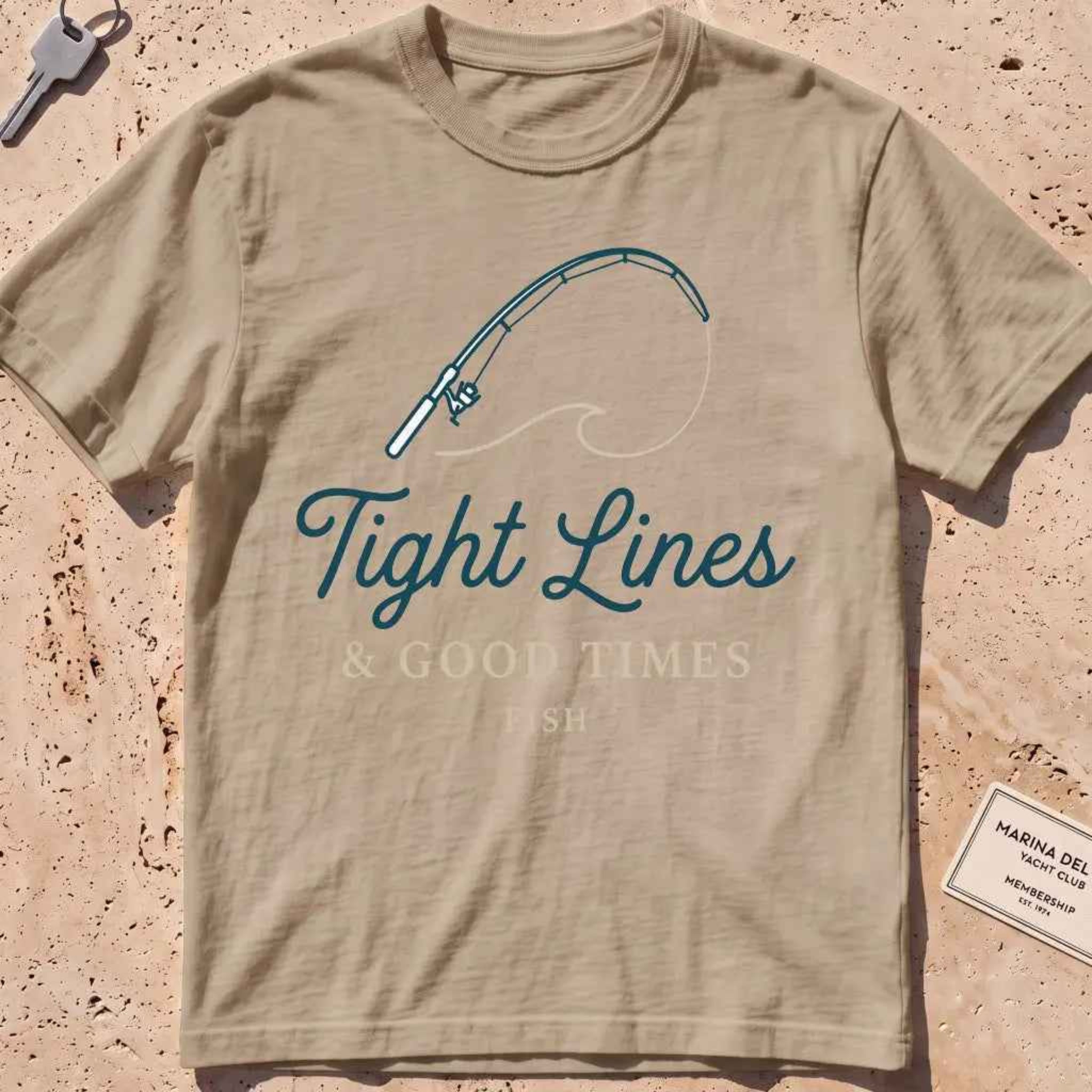 khaki heavyweight tee with a bent rod and "Tight Lines and Good Times" script.