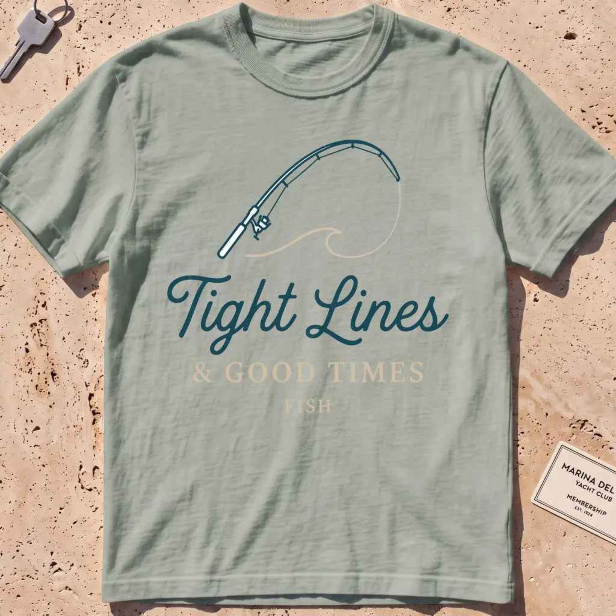 bay heavyweight tee with a bent rod and "Tight Lines and Good Times" script.
