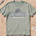 bay heavyweight tee with a compass and bold "Uncharted" exploration type.