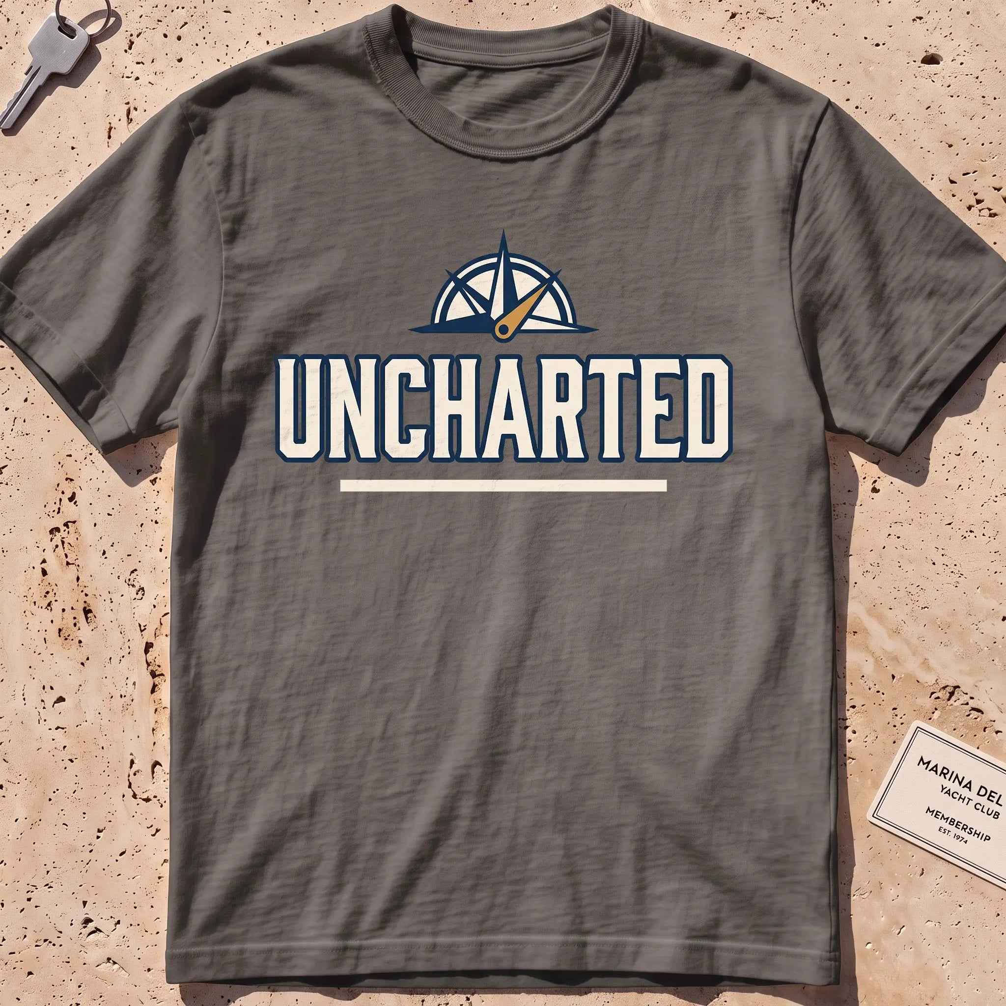 pepper heavyweight tee with a compass and bold "Uncharted" exploration type.