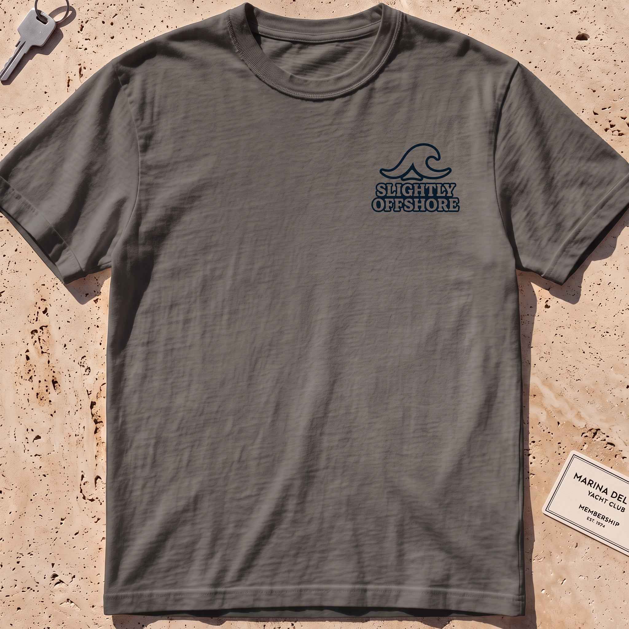 pepper heavyweight tee with a single wave and wordmark crest graphic.
