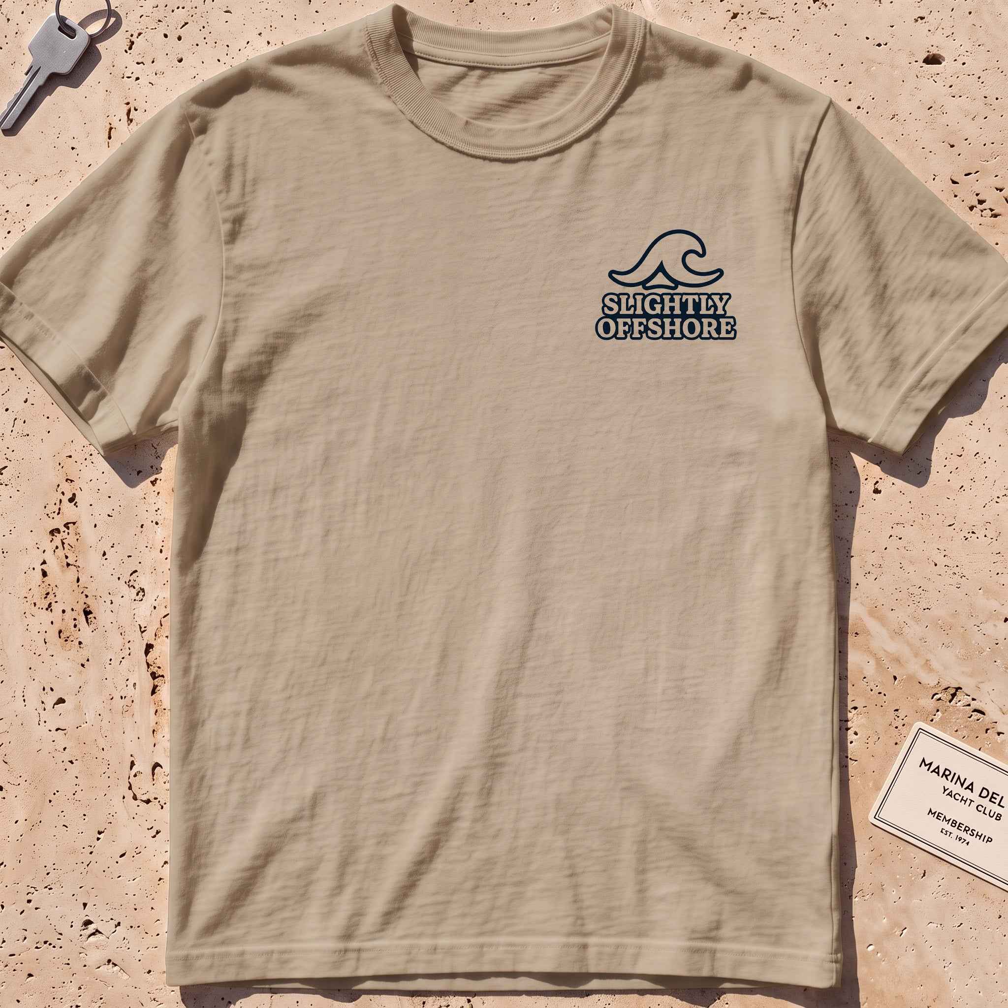 khaki heavyweight tee with a single wave and wordmark crest graphic.