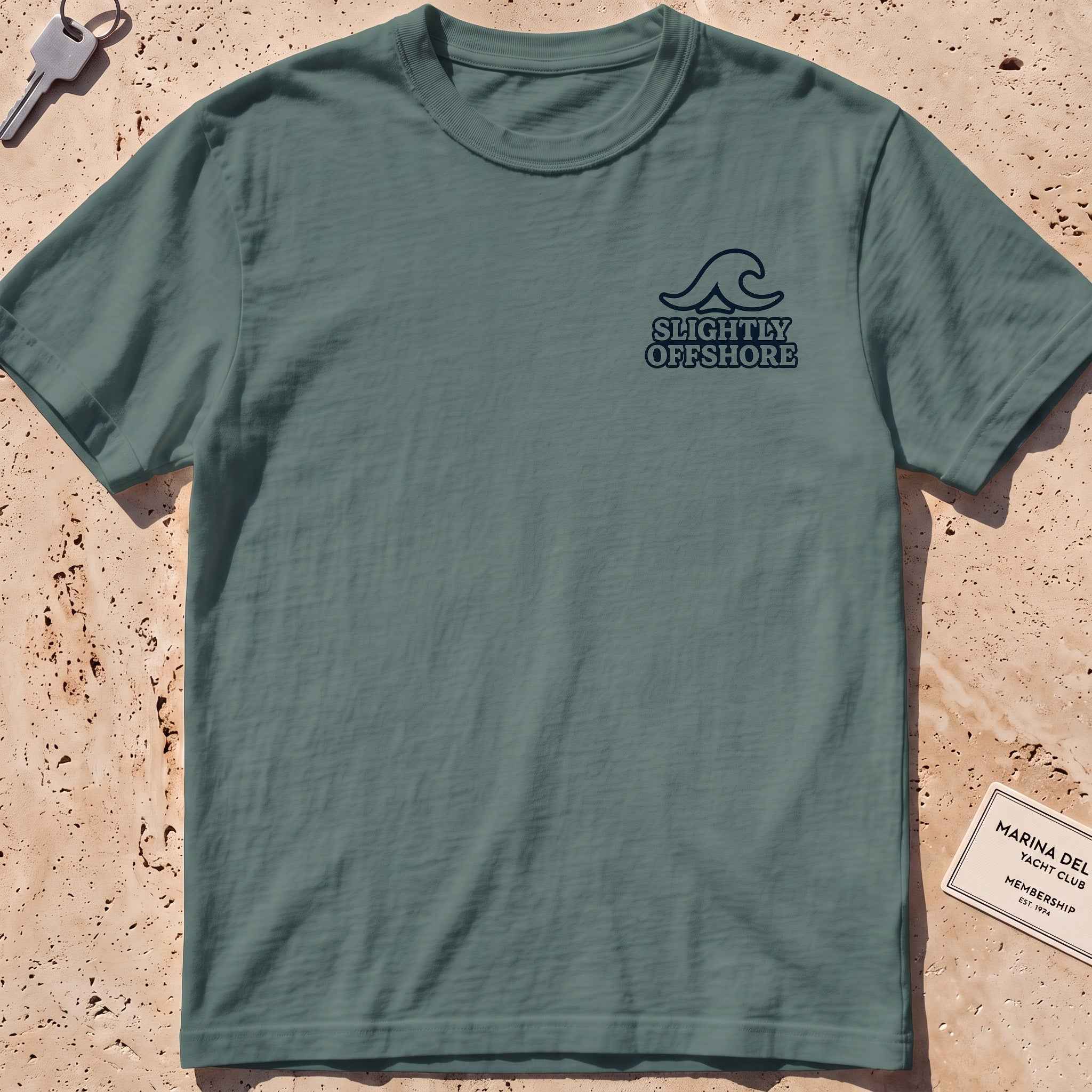 blue spruce heavyweight tee with a single wave and wordmark crest graphic.