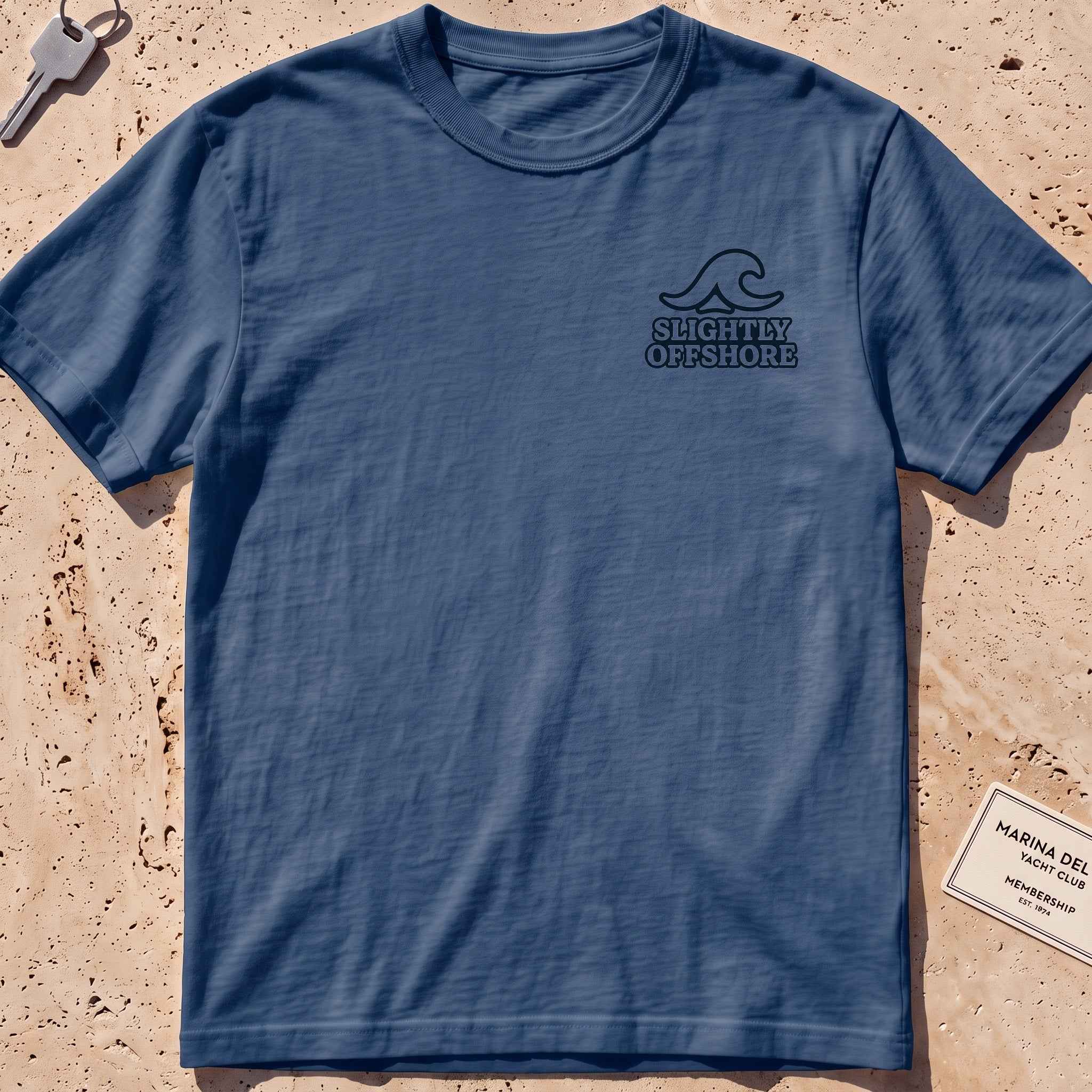 midnight heavyweight tee with a single wave and wordmark crest graphic.