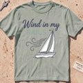 bay heavyweight tee with a line-art sailboat "Wind in My Sails" graphic.