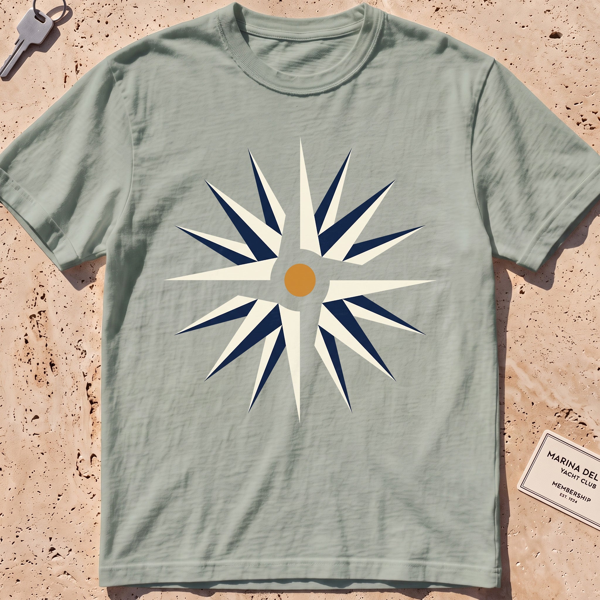 bay heavyweight tee with a flat-geometric wind rose graphic.