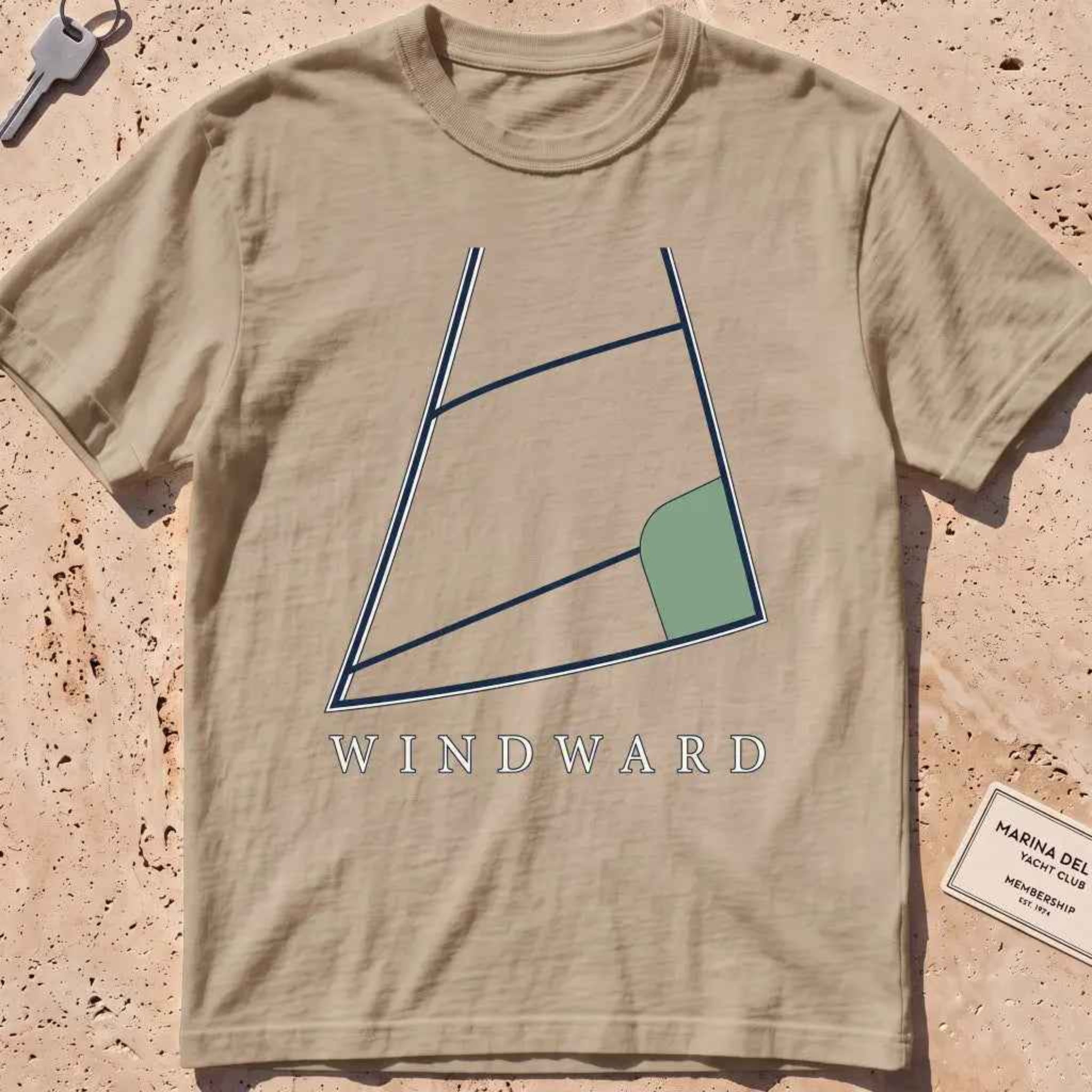 khaki heavyweight tee with a bold close-cropped mainsail filling the frame graphic.